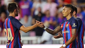 FORT LAUDERDALE, FLORIDA - JULY 19: Raphinha #22 (R) and Eric Garcia #24 of FC Barcelona celebrate their first goal by Pierre-Emerick Aubameyang #17 during the first half of a preseason friendly against Inter Miami CF at DRV PNK Stadium on July 19, 2022 in Fort Lauderdale, Florida. (Photo by Michael Reaves/Getty Images)