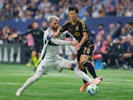 VANCOUVER, BRITISH COLUMBIA - NOVEMBER 22: Son Heung-Min #7 of Los Angeles FC is challenged by Tristan Blackmon #33 of Vancouver Whitecaps FC during the conference semifinal between Vancouver Whitecaps FC and Los Angeles Football Club at BC Place as part of the 2025 MLS Cup Playoffs on November 22, 2025 in Vancouver, British Columbia. Jeff Vinnick/Getty Images/AFP (Photo by JEFF VINNICK / GETTY IMAGES NORTH AMERICA / Getty Images via AFP)