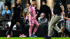 Members of the security stand alert as Inter Miami's Argentine forward #10 Lionel Messi walks during the international friendly match between Inter Miami and Newell's Old Boys at DRV PNK Stadium in Fort Lauderdale, Florida on February 15, 2024. (Photo by CHANDAN KHANNA / AFP)