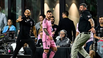 Members of the security stand alert as Inter Miami's Argentine forward #10 Lionel Messi walks during the international friendly match between Inter Miami and Newell's Old Boys at DRV PNK Stadium in Fort Lauderdale, Florida on February 15, 2024. (Photo by CHANDAN KHANNA / AFP)