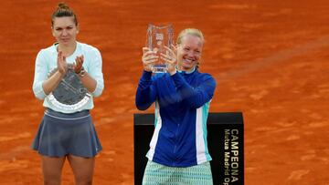 Tennis - WTA Premier Mandatory - Madrid Open - The Caja Magica, Madrid, Spain - May 11, 2019   Netherlands&#039; Kiki Bertens celebrates with the trophy after winning the final against Romania&#039;s Simona Halep   REUTERS/Susana Vera