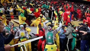 Soccer Football - CAF Africa Cup of Nations - Morocco 2025 - Final - Senegal v Morocco - Prince Moulay Abdellah Stadium, Rabat, Morocco - January 18, 2026 Senegal fans clash with security as fans invade the pitch after Morocco were awarded a penalty following a VAR review REUTERS/Siphiwe Sibeko