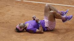 Spain's Rafael Nadal falls on the court as he attempts to return the ball to Germany's Alexander Zverev during their quarter-final match at the Italian Open tennis tournament, in Rome, Friday, May 14, 2021. (AP Photo/Gregorio Borgia)