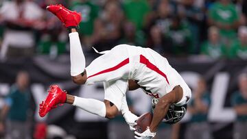 Sep 16, 2024; Philadelphia, Pennsylvania, USA; Atlanta Falcons wide receiver Darnell Mooney (1) flips into the end zone for a touchdown against the Philadelphia Eagles during the third quarter at Lincoln Financial Field. Mandatory Credit: Bill Streicher-Imagn Images