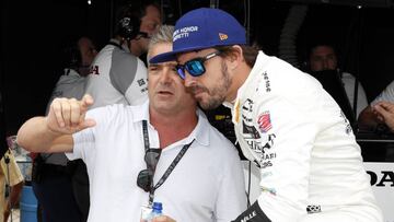 May 17, 2017; Indianapolis, IN, USA; Verizon IndyCar Series driver Fernando Alonso talks with Gil de Ferran during practice for the 101st Running of the Indianapolis 500 at Indianapolis Motor Speedway. Mandatory Credit: Brian Spurlock-USA TODAY Sports