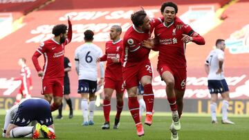 LIVERPOOL, ENGLAND - APRIL 10: Trent Alexander-Arnold of Liverpool celebrates with teammate Xherdan Shaqiri after scoring their team's second goal during the Premier League match between Liverpool and Aston Villa at Anfield on April 10, 2021 in Liver