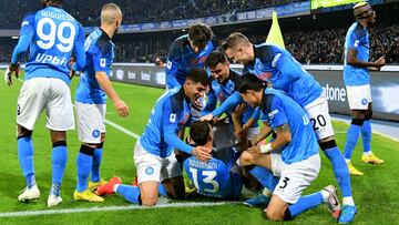 Napoli's Kosovan defender Amir Rrahmani celebrates with team mates after scoring a goal during the Italian Serie A football match between Napoli and Juventus at the Diego-Maradona stadium in Naples on January 13, 2023. (Photo by Alberto PIZZOLI / AFP)