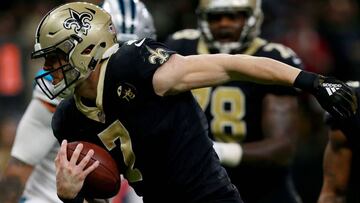 NEW ORLEANS, LOUISIANA - DECEMBER 30: Taysom Hill #7 of the New Orleans Saints runs the ball for a touchdown during the second half against the Carolina Panthers at the Mercedes-Benz Superdome on December 30, 2018 in New Orleans, Louisiana.   Sean Gardner/Getty Images/AFP
 == FOR NEWSPAPERS, INTERNET, TELCOS &amp; TELEVISION USE ONLY ==