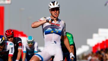 Merlier celebra su victoria en Dubái.