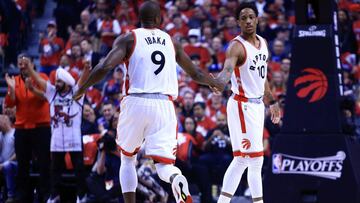 TORONTO, ON - APRIL 24: Serge Ibaka #9 and DeMar DerRozan #10 of the Toronto Raptors slap hands in the first half of Game Five of the Eastern Conference Quarterfinals against the Milwaukee Bucks during the 2017 NBA Playoffs at Air Canada Centre on April 24, 2017 in Toronto, Canada. NOTE TO USER: User expressly acknowledges and agrees that, by downloading and or using this photograph, User is consenting to the terms and conditions of the Getty Images License Agreement.   Vaughn Ridley/Getty Images/AFP
 == FOR NEWSPAPERS, INTERNET, TELCOS &amp; TELEVISION USE ONLY ==
