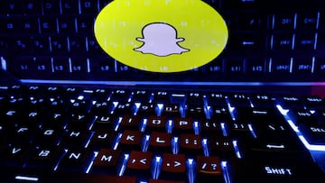 FILE PHOTO: A keyboard is placed in front of a displayed Snapchat logo in this illustration taken February 21, 2023. REUTERS/Dado Ruvic/Illustration/File Photo