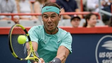 Nadal salva el día en un partido largo y tedioso por la lluvia