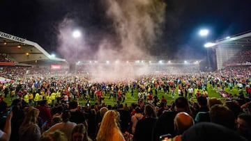 Nottingham Forest fans celebrate on the pitch after they reach the play off final during the Sky Bet Championship play-off semi-final, second leg match at the City Ground, Nottingham. Picture date: Tuesday May 17, 2022. (Photo by Zac Goodwin/PA Images via Getty Images)