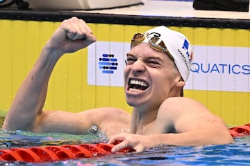 France's Leon Marchand reacts after winning in the final of the men's 400m medley swimming event during the World Aquatics Championships in Fukuoka on July 23, 2023. (Photo by Philip FONG / AFP)