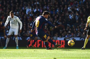 Lionel Messi of Barcelona scores his side's second goal from the penalty spot.