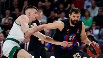 BARCELONA, 26/04/2023.- El alero lituano del Zalgiris Kauna, Arnas Butkevicius (i) disputa una posesión con Nikola Mirotic (d), ala-pívot del Barcelona durante el primer partido de los cuartos de final de la EuroLiga que Barça y Zalgiris Kaunas disputan hoy miércoles en el Palau Blaugrana. EFE/ Enric Fontcuberta.