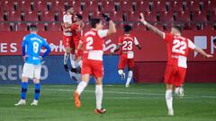 GIRONA, SPAIN - DECEMBER 10: Cristhian Stuani of Girona FC celebrates with teammates after scoring the opening goal during the LaLiga SmartBank match between Girona FC and UD Logrones at Montilivi Stadium on December 10, 2020 in Girona, Spain. Sporting st