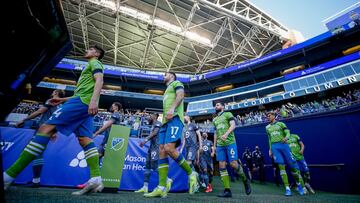 Apr 16, 2021; Seattle, Washington, USA; The Minnesota United FC and the Seattle Sounders FC enter the field before the start of a game at Lumen Field. Mandatory Credit: Jennifer Buchanan-USA TODAY Sports
