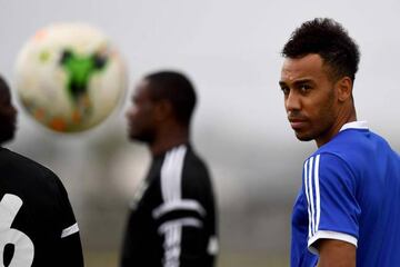 Gabon's forward Pierre-Emerick Aubameyang looks on as he takes part in a training session in Libreville on January 17, 2017 during the 2017 Africa Cup of Nations football tournament in Gabon.