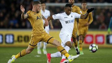 Toby Alderweireld y Jordan Ayew.