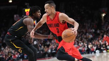 Mar 15, 2018; Portland, OR, USA; Portland Trail Blazers guard CJ McCollum (3) drives past Cleveland Cavaliers guard John Holland (10) in the second half at Moda Center. Mandatory Credit: Jaime Valdez-USA TODAY Sports