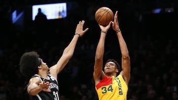 Apr 1, 2019; Brooklyn, NY, USA; Milwaukee Bucks forward Giannis Antetokounmpo (34) shoots the ball over Brooklyn Nets center Jarrett Allen (31) during the second half at Barclays Center. Mandatory Credit: Noah K. Murray-USA TODAY Sports
