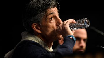 Real Sociedad's Spanish coach Imanol Alguacil drinks water during a press conference on the eve of their UEFA Champions League last 16 second leg football match against Paris Saint-Germain (PSG) at the Reale Arena stadium in San Sebastian on March 4, 2024. (Photo by ANDER GILLENEA / AFP)