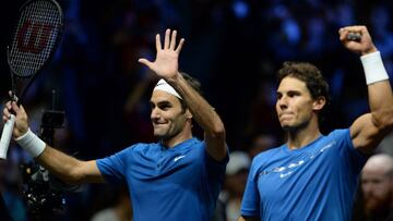 Switzerland's Roger Federer of Team Europe and his teammate Spain's Rafael Nadal celebrate their victory over team World's Sam Querrey and Jack Sock during the second day of Laver Cup on September 23, 2017 in O2 Arena, in Prague. / AFP PHOTO / Michal Cizek
