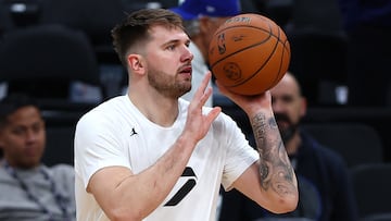 BOSTON, MASSACHUSETTS - JUNE 05: Luka Doncic #77 of the Dallas Mavericks takes a shot during the 2024 NBA Finals Media Day at TD Garden on June 05, 2024 in Boston, Massachusetts. Maddie Meyer/Getty Images/AFP (Photo by Maddie Meyer / GETTY IMAGES NORTH AMERICA / Getty Images via AFP)