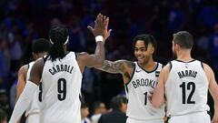 PHILADELPHIA, PA - APRIL 13: D&#039;Angelo Russell #1 of the Brooklyn Nets celebrates with teammates DeMarre Carroll #9 and Joe Harris #12 after beating the Philadelphia 76ers 111-102 during Game One of the first round of the 2019 NBA Playoff at Wells Far