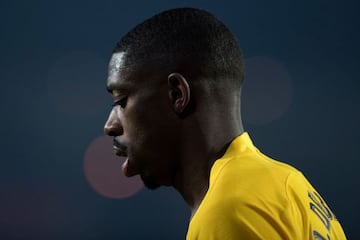 (FILES) In this file photo taken on January 8, 2022 Barcelona's French forward Ousmane Dembele reacts during the Spanish league football match between Granada FC and FC Barcelona at Nuevo Los Carmenes stadium in Granada. -