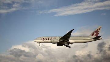 FILE PHOTO: FILE PHOTO: A Qatar Airways cargo Boeing 777 plane takes off from Paris Charles de Gaulle airport in Roissy-en-France near Paris, France, December 2, 2021. REUTERS/Sarah Meyssonnier/File Photo/File Photo