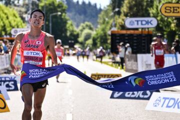 Japan's Toshikazu Yamanishi crosses the finish line to win the men's 20km race walk final during the World Athletics Championships in Eugene, Oregon on July 15, 2022. (Photo by Jim WATSON / AFP) (Photo by JIM WATSON/AFP via Getty Images)