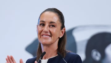 Mexico's President Claudia Sheinbaum applauds during a press conference, as U.S. President Donald Trump threatened on Saturday to impose a 30% tariff on imports from Mexico and the European Union starting on August 1, in Mexico City, Mexico July 14, 2025. REUTERS/Raquel Cunha