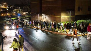 SEATTLE, WA - JANUARY 29: People wait in line for a last-minute COVID-19 vaccine event at Seattle University after a freezer failure at a nearby hospital on January 29, 2021 in Seattle, Washington. The impromptu overnight event was one of three in the cit