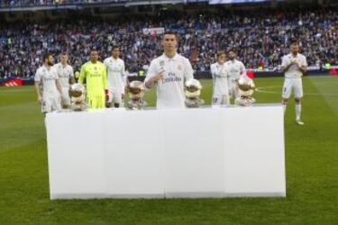 Cristiano con sus cuatro balones de oro