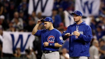 CLEVELAND, OH - NOVEMBER 01: Miguel Montero #47 and Jon Lester #34 of the Chicago Cubs react after defeating the Cleveland Indians 9-3 to win Game Six of the 2016 World Series at Progressive Field on November 1, 2016 in Cleveland, Ohio.   Elsa/Getty Images/AFP
 == FOR NEWSPAPERS, INTERNET, TELCOS &amp; TELEVISION USE ONLY ==