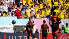 Colombia's forward #11 Jhon Arias (L) celebrates scoring his team's first goal during the international friendly football match between the USA and Colombia at Commanders Field in Greater Landover, Maryland, on June 8, 2024. (Photo by ROBERTO SCHMIDT / AFP)