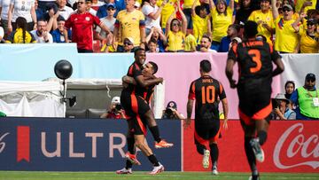 Colombia's forward #11 Jhon Arias (L) celebrates scoring his team's first goal during the international friendly football match between the USA and Colombia at Commanders Field in Greater Landover, Maryland, on June 8, 2024. (Photo by ROBERTO SCHMIDT / AFP)