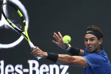 Nadal defeats Isner to set up semi-final against Dimitrov