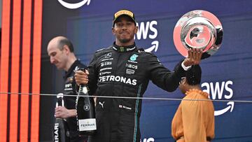 Second placed Mercedes' British driver Lewis Hamilton celebrates on the podium after the Spanish Formula One Grand Prix race at the Circuit de Catalunya on June 4, 2023 in Montmelo, on the outskirts of Barcelona. (Photo by JAVIER SORIANO / AFP)