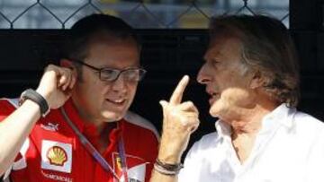 <b>RESPONSABLES. </b>Domenicali, jefe del equipo Ferrari, habla con Montezemolo, el presidente de la marca.