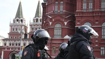 Police officers stand guard during a protest against Russian military action in Ukraine, in Manezhnaya Square in central Moscow on March 13, 2022. (Photo by AFP)