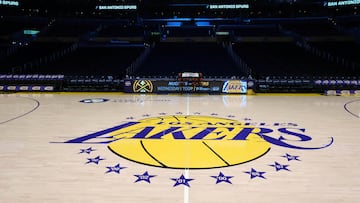 FILE PHOTO: Mar 17, 2025; Los Angeles, California, USA; The Los Angeles Lakers logo at midcourt at Crypto.com Arena. Mandatory Credit: Kirby Lee-Imagn Images/File Photo