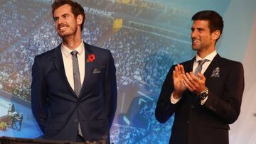 LONDON, ENGLAND - NOVEMBER 10: Andy Murray of Great Britain and Novak Djokovic of Serbia watch Thepetebox perform (out of frame) during previews for the Barclays ATP World Tour FInals at the Cutty Sark on November 10, 2016 in London, England. (Photo by Julian Finney/Getty Images)