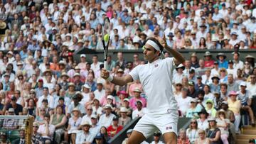 Swiss Roger Federer plays a backhand in his match against German Jan-Lennard Struff on the fifth day of the 2018 Wimbledon championships, London on July 6, 2018. Federer defeated Struff 6-3 7-5 6-2       Photo by Hugo Philpott/UPI *** Local Caption *** .