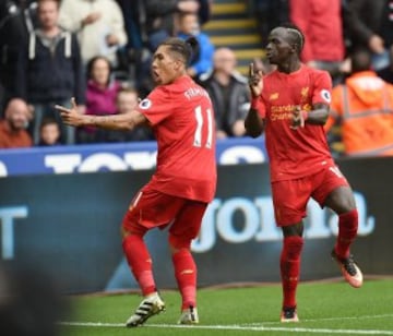 Tacka tacka... Firmino celebrates.