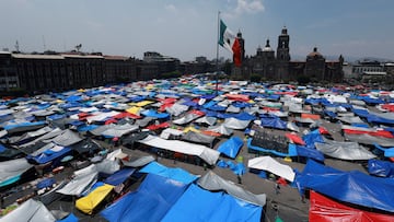 A protest with tents and tarps is set up by members of the National Coordination of Education Workers (CNTE) to demand dialogue from the government regarding their labor and educational demands, at Zocalo square, in Mexico City, Mexico May 21, 2025. REUTERS/Henry Romero