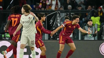 Roma's French midfielder #08 Neil El Aynaoui celebrates with teammates after scoring his team's first goal during the UEFA Europa League 1st round day 5 football match between AS Roma and Midtjylland at the Olympic Stadium in Rome on November 27, 2025. (Photo by Filippo MONTEFORTE / AFP)