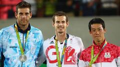 RIO DE JANEIRO, BRAZIL - AUGUST 14: (L-R) Silver medalist Juan Martin Del Potro of Argentina, gold medalist Andy Murray of Great Britain and bronze medalist Kei Nishikori of Japan pose on the podium during the medal ceremony for the men&#039;s singles on Day 9 of the Rio 2016 Olympic Games at the Olympic Tennis Centre on August 14, 2016 in Rio de Janeiro, Brazil.  (Photo by Clive Brunskill/Getty Images)